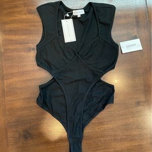 NWT. Black side cut out bodysuit